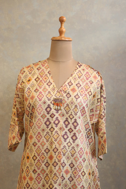 Lightly Embellished Neck Tunic